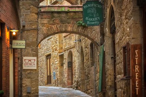 medieval street of old town of Volterra in Tuscany, Italy